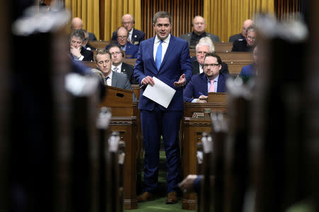 Conservative leader Andrew Scheer speaks during Question Period in the interim House of Commons in the West Block on Parliament Hill in Ottawa, Ontario, Canada, February 20, 2019. REUTERS/Chris Wattie