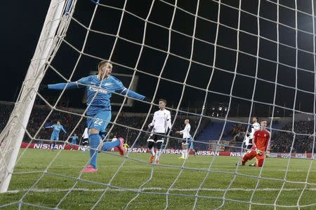 Football Soccer - Zenit St. Petersburg v Valencia - Champions League Group Stage - Group H - Petrovsky stadium, St. Petersburg, Russia - 24/11/2015 Zenit St. Peterburg's Artem Dzyuba celebrates after scoring the second goal for Valencia REUTERS/Grigory Dukor