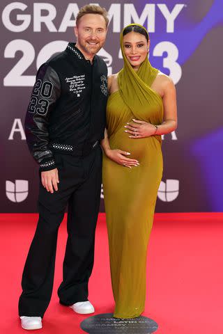 <p>Neilson Barnard/Getty</p> David Guetta and Jessica Ledon in November at the Latin Grammy Awards