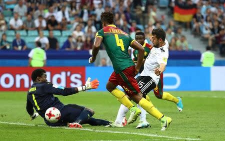 Soccer Football - Germany v Cameroon - FIFA Confederations Cup Russia 2017 - Group B - Fisht Stadium, Sochi, Russia - June 25, 2017 Cameroon’s Fabrice Ondoa in action with Germany’s Amin Younes REUTERS/Kai Pfaffenbach