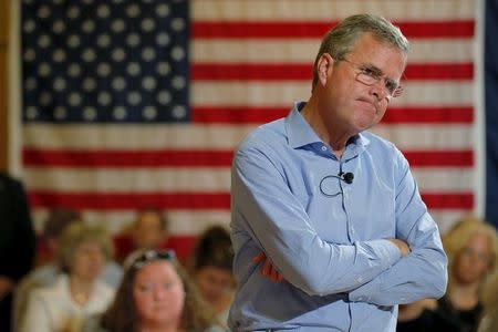 Republican presidential candidate Jeb Bush listens to a question from the audience during a town hall meeting campaign stop at the Medallion Opera House in Gorham, New Hampshire July 23, 2015. REUTERS/Brian Snyder
