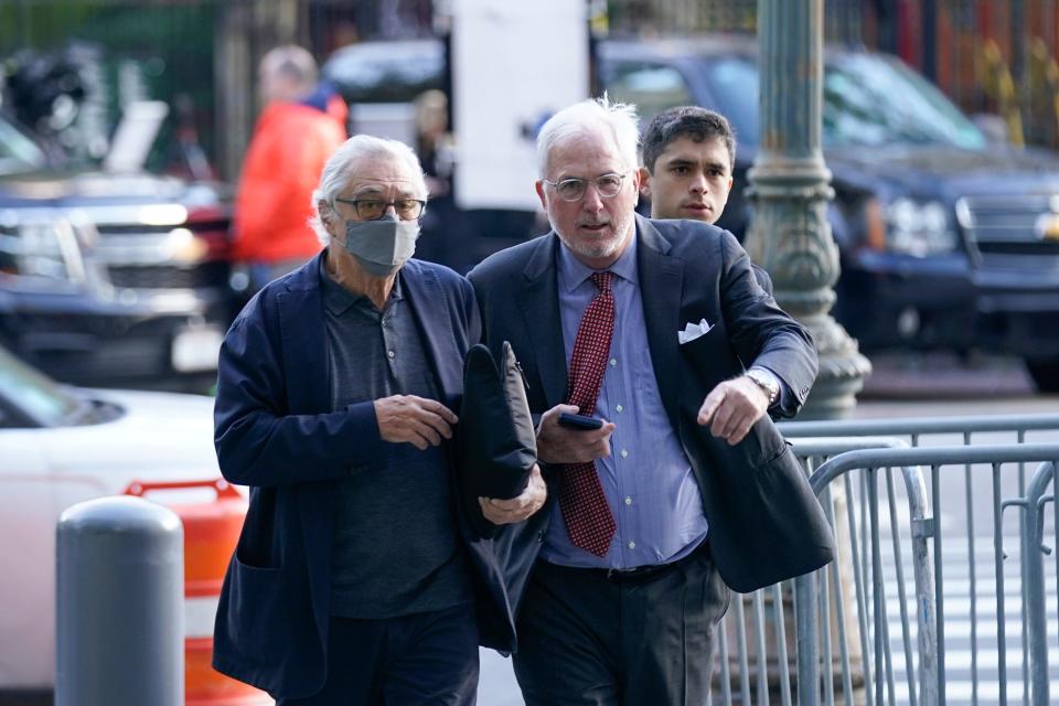 Robert De Niro arrives at a New York courthouse on Oct. 31, 2023. The 80-year-old actor is being sued by a former assistant, Graham Chase Robinson. De Niro is also suing Robinson, accusing her of charging personal expenses to his company.