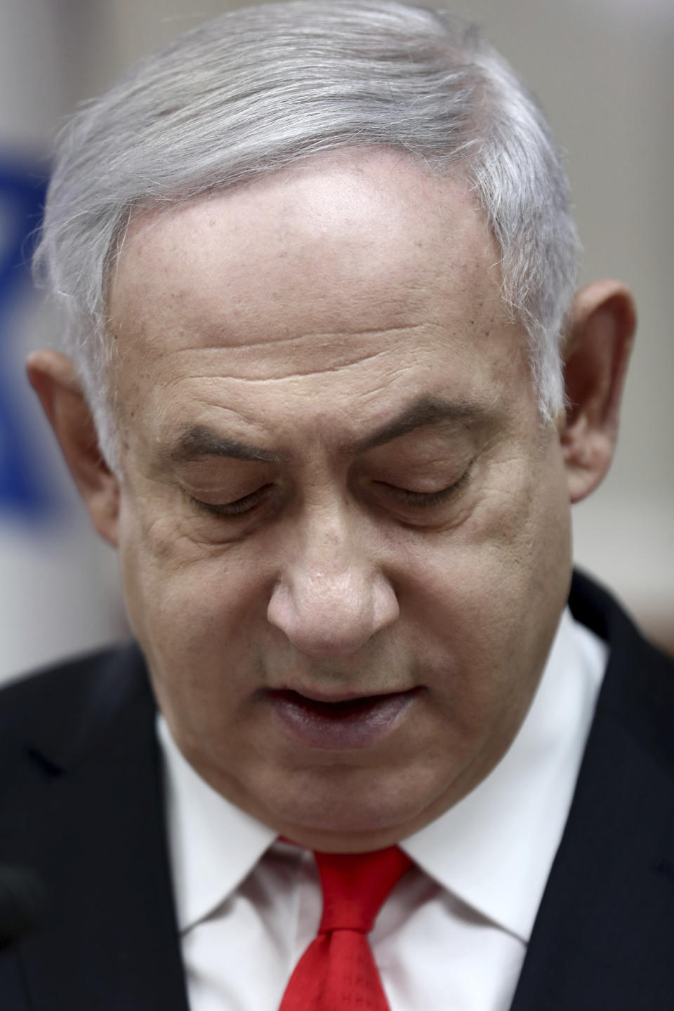 Israeli Prime Minister Benjamin Netanyahu reacts during the weekly cabinet meeting, at his office in Jerusalem, Sunday, Dec. 15, 2019. (Gali Tibbon/Pool via AP)