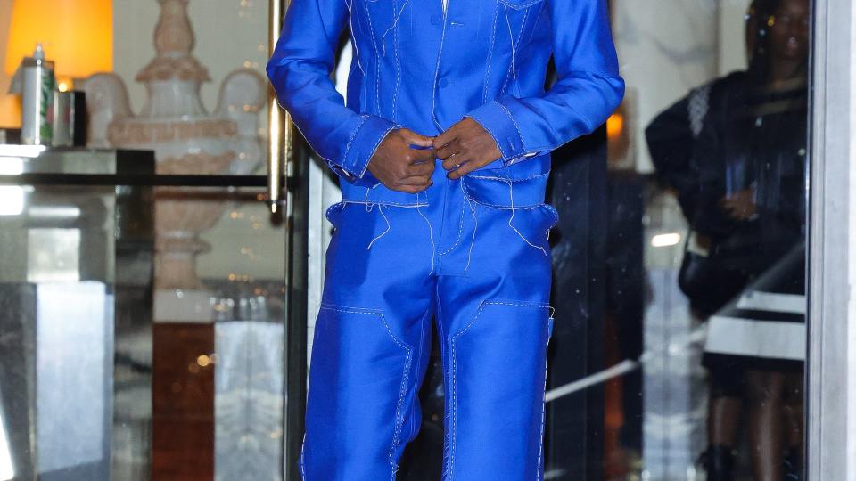 David Banda wearing blue jacket and trousers 