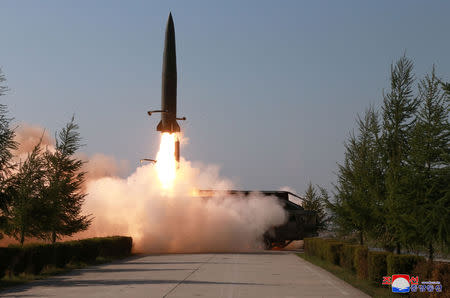 A missile is seen launched during a military drill in North Korea, in this May 10, 2019 photo supplied by the Korean Central News Agency (KCNA). KCNA via REUTERS