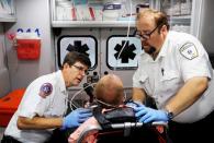 FILE PHOTO: Cataldo Ambulance medicscare for a man. who was found unresponsive after overdosing