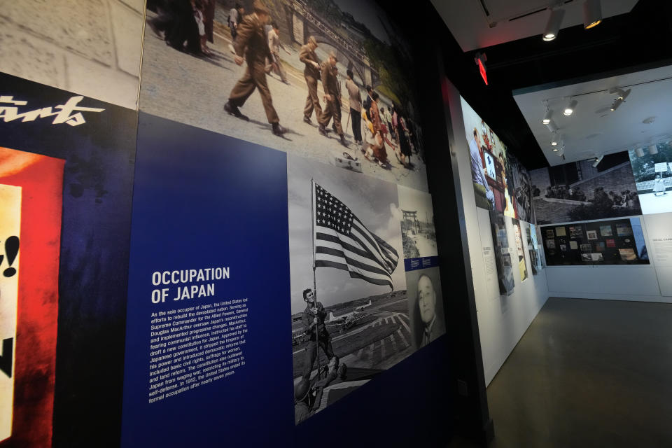 Imagery of post-war Japan are part of the new pavilion of the National World War II Museum, in New Orleans, photographed Tuesday, Oct. 31, 2023. The latest major addition to the museum is called the Liberation Pavilion. And it's ambitious in scope. The grim yet hopeful addition addresses the conflict's world-shaping legacy. (AP Photo/Gerald Herbert)