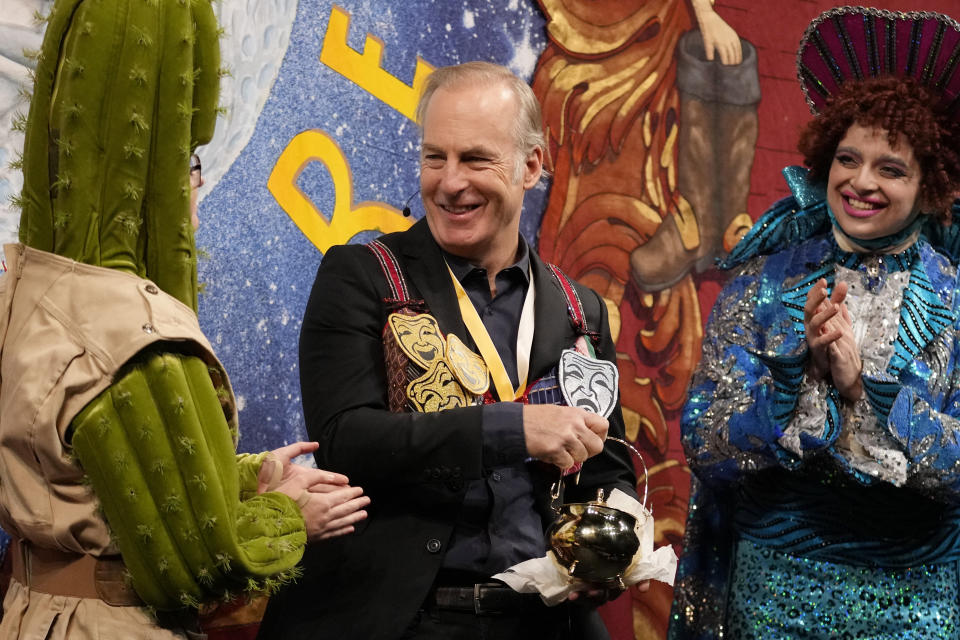 Actor Bob Odenkirk smiles during a roast while being honored as Man of the Year by Harvard University's Hasty Pudding Theatricals, Thursday, Feb. 2, 2023, in Cambridge, Mass. (AP Photo/Charles Krupa)