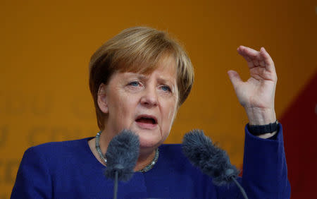 German Chancellor Angela Merkel, a top candidate of the Christian Democratic Union Party (CDU) for the upcoming general elections, gestures as she speaks during an election rally in Fritzlar, Germany September 21, 2017. REUTERS/Kai Pfaffenbach