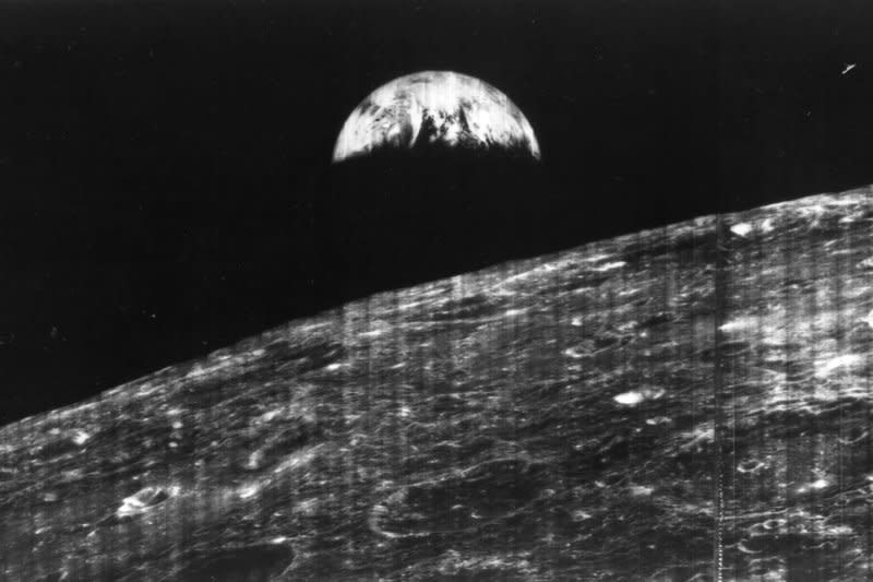 The first photograph of the Earth from the distance of the moon taken by Lunar Orbiter 1 on August 23, 1966. The unmanned spacecraft began orbiting the moon. File Photo courtesy of NASA