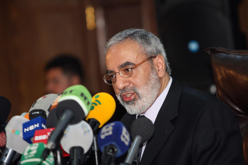 Syrian Information Minister Omran al-Zoubi speaks during a press conference in Damascus, Syria on Tuesday, Jan. 7, 2014. Al-Zoubi said that ordinary citizens will pressure ruler Bashar Assad to run for president again when elections are next slated for July and that he believes Syrians want Assad again as their leader, but the final decision to run again would be for the president to decide. (AP Photo)