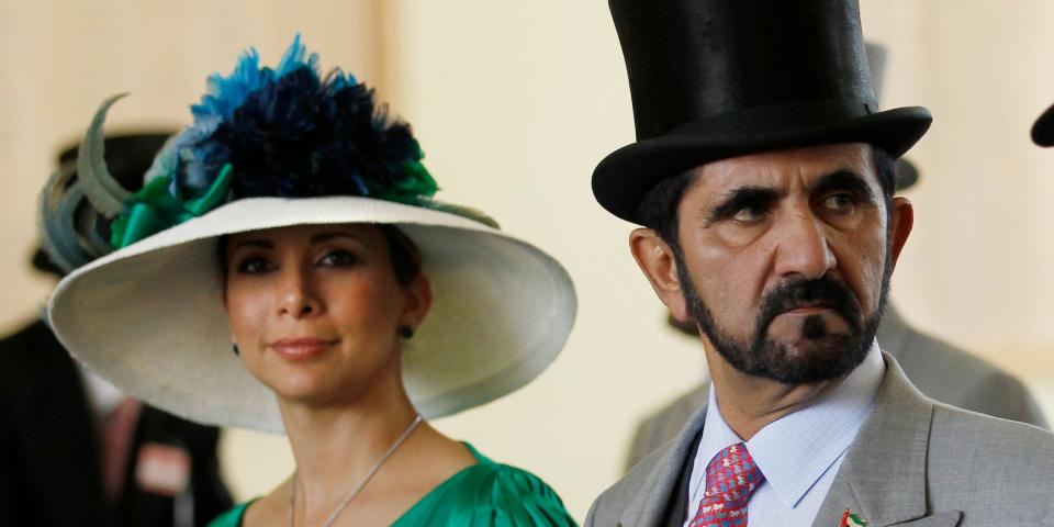 Jordanian Princess Haya bint Al-Hussein and husband Dubai ruler Sheikh Mohammed bin Rashid al-Maktoum walk to the parade ring on Ladies Day the third day of racing at Royal Ascot in southern England