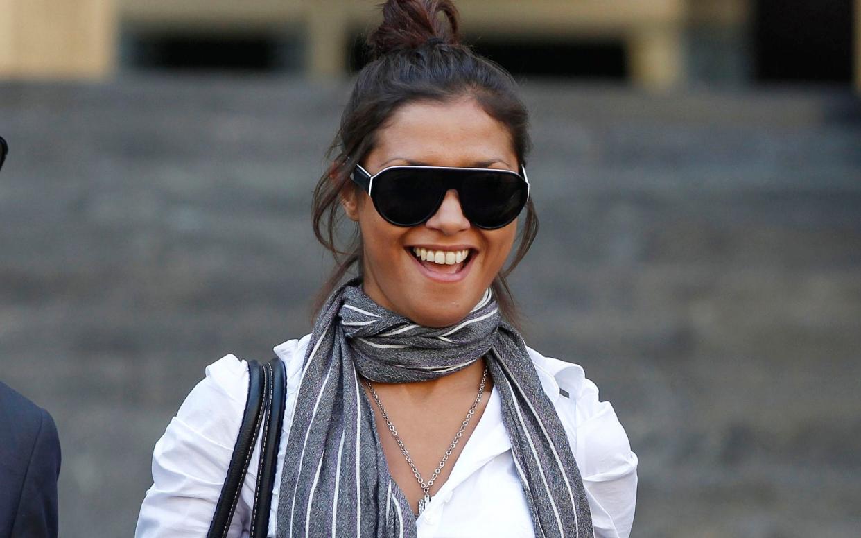 In a file photo from 2011, Imane Fadil smiles as she leaves court in Milan - AP