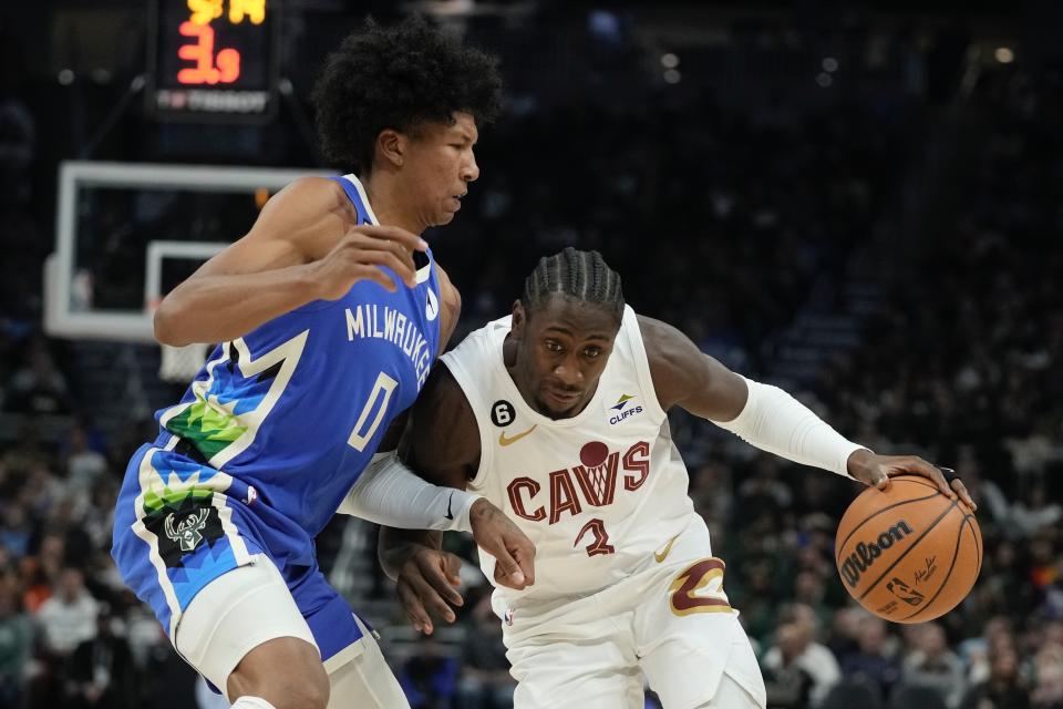 Cleveland Cavaliers' Caris LeVert tries to drive past Milwaukee Bucks' MarJon Beauchamp during the first half of an NBA basketball game Wednesday, Nov. 16, 2022, in Milwaukee. (AP Photo/Morry Gash)