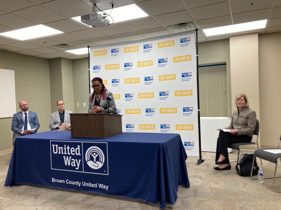 Officials from Brown County United Way, the city, the county and U.S. Sen. Tammy Baldwin announce a $1 million federal grant for a new "community house" in Green Bay on Wednesday, April 13.