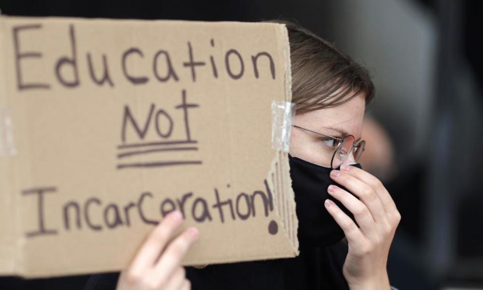 People protest outside Los Angeles unified school district headquarters to demand that the Board of Education defund school police.