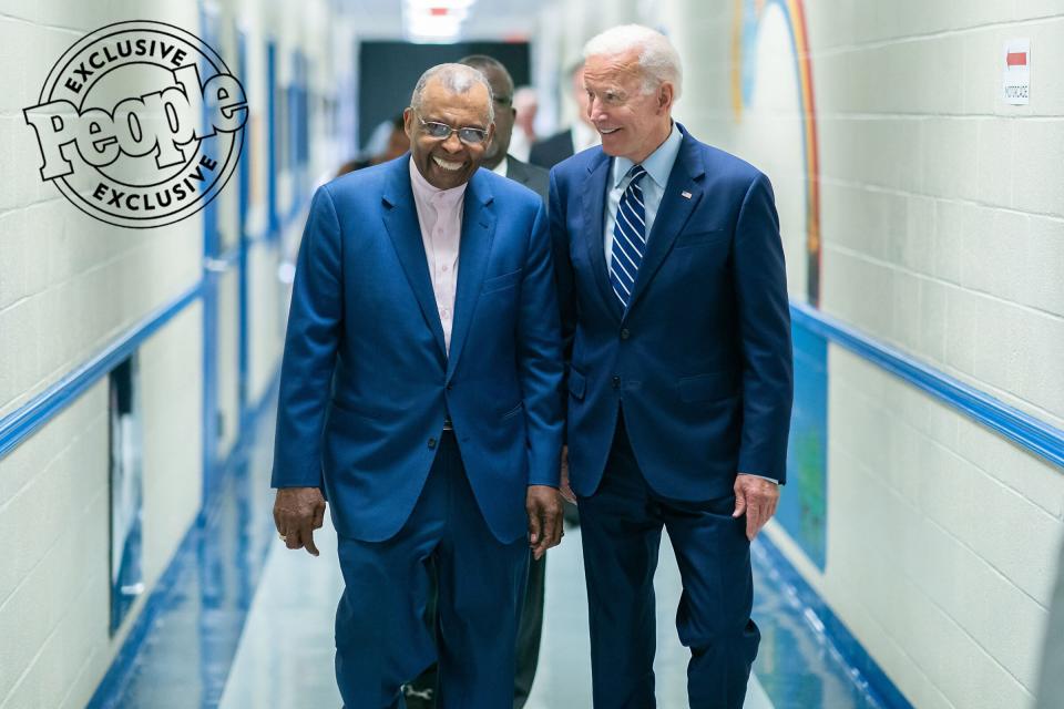 Biden and Dr. Marion Newton walk through the hallways of the M.H. Newton Family Life Center before taking the stage at a community event in Sumter, South Carolina, on July 6, 2019.