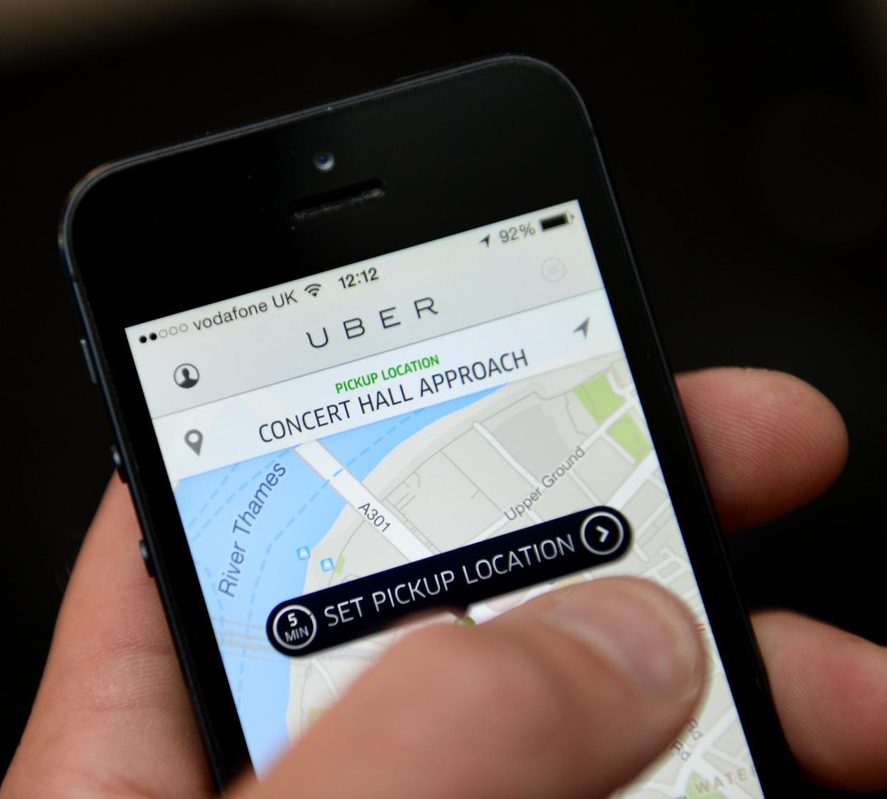 Uber will offer discounts to young adults who get a Covid jab (Andrew Matthews/PA) (PA Archive)