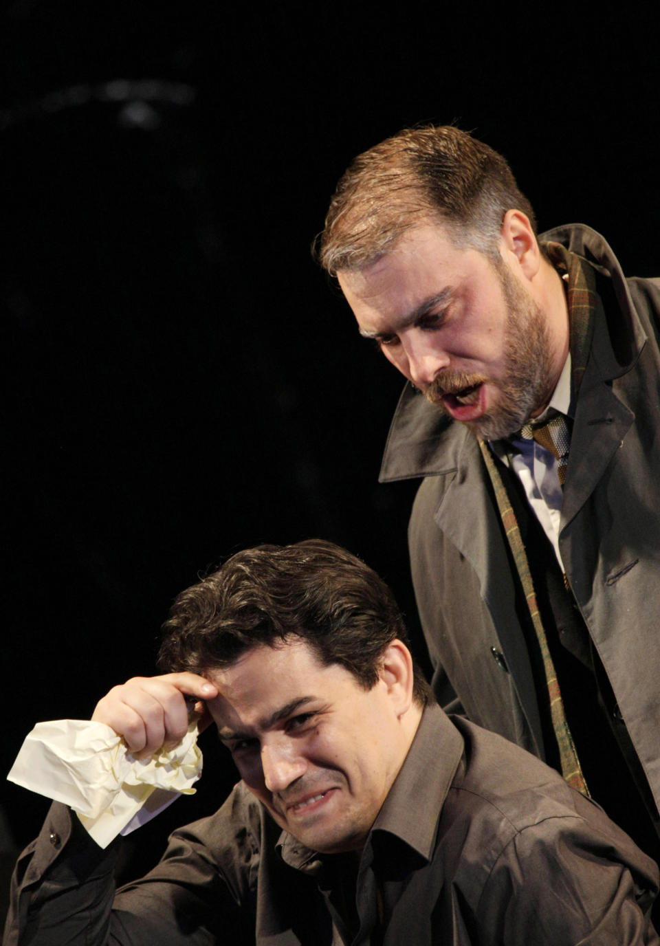 In this picture taken Wednesday, May 23, 2012, Gabriele Viviani in the role of Giorgio Germont, right, and Saimir Pirgu as Alfredo Germont perform during a dress rehearsal at the Theater an der Wien in Vienna, Austria, for the opera "La Traviata" by Giuseppe Verdi. (AP Photo/dapd, Lilli Strauss)