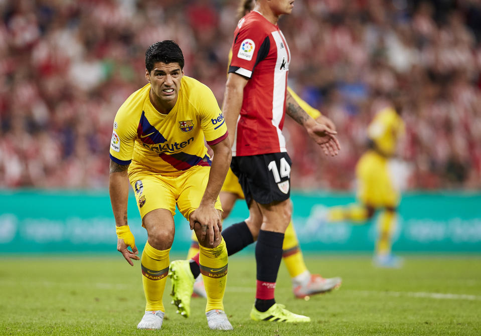 Barcelona's Luis Suarez reacts during the Spanish La Liga soccer match between Athletic Bilbao and FC Barcelona at San Mames stadium in Bilbao, northern Spain, Friday, Aug. 16, 2019. (AP Photo/Ion Alcoba Beitia)
