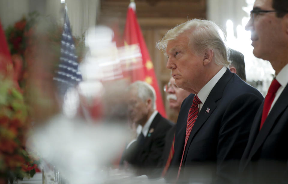 President Donald Trump listens to China's President Xi Jinping speak during their bilateral meeting at the G20 Summit, Saturday, Dec. 1, 2018 in Buenos Aires, Argentina. (AP Photo/Pablo Martinez Monsivais)