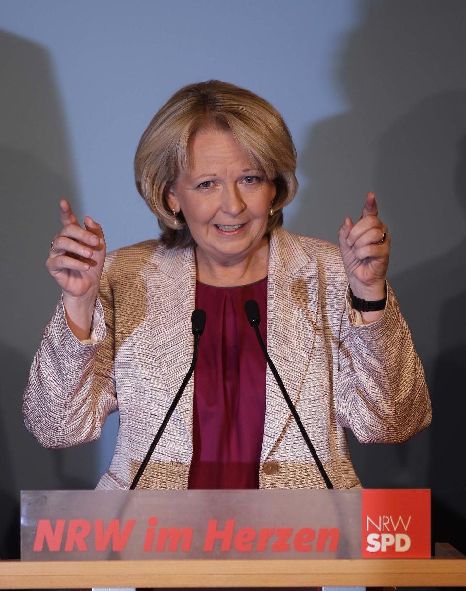 Social Democratic Party top candidate for the state elections of North Rhine-Wesphalia, Hannelore Kraft, reacts after first results were published in Duesseldorf, Germany, Sunday May 13, 2012. Germany's most populated and industrial state holds parliament elections on Sunday. (AP Photo/Frank Augstein)