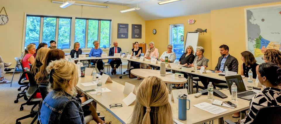 Massachusetts Department of Early Education and Care Commissioner Amy Kershaw meets June 2 with Cape Cod child care providers at the Cape Cod Chamber of Commerce in Centerville. Kershaw faces the camera, at left in navy.