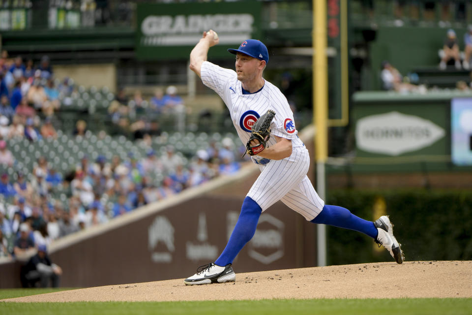 Chicago Cubs starting pitcher Adrian Sampson throws against the Miami Marlins during the first inning of a baseball game, Sunday, Aug. 7, 2022, at Wrigley Field in Chicago. (AP Photo/Mark Black)