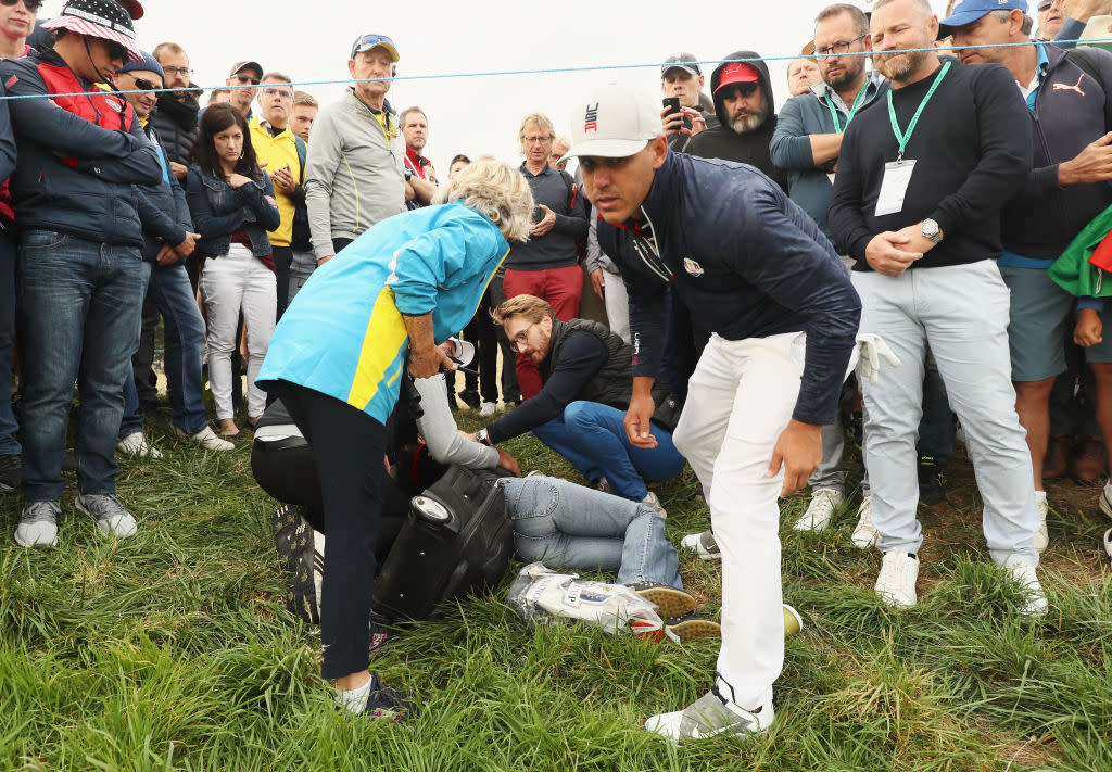 Brooks Koepka hit a spectator in the face with a drive. (Getty)