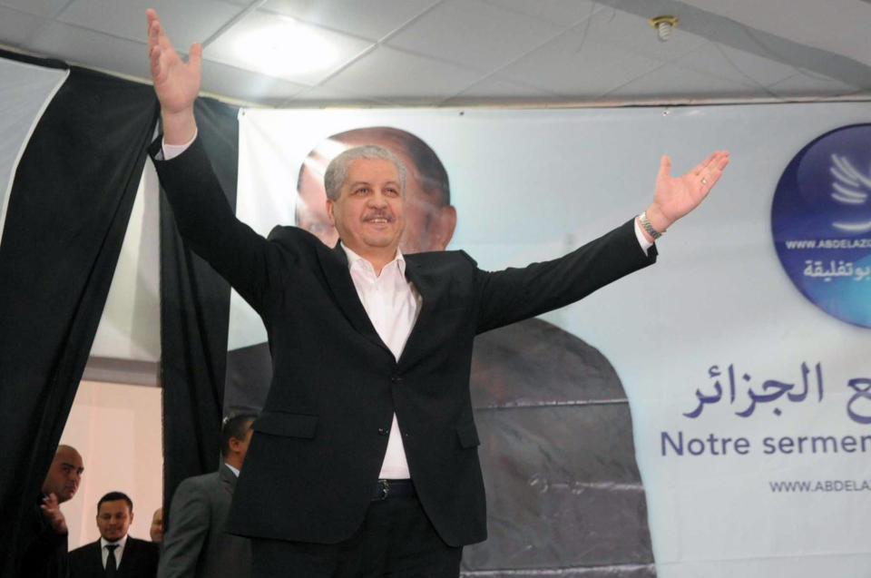 Outgoing Algerian Prime Minister and newly appointed Algerian president's campaign manager Abdelmalek Sellal gestures prior to delivering a speech during a meeting, the first day of the Presidential election campaign, in Adrar, southern Algeria, Sunday, March 23, 2014. Algeria's ailing president has asked the country to vote him in for a fourth term in April's elections, promising to amend the constitution and solve the country's social woes. (AP Photo/Sidali Djarboub)