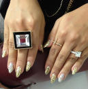 <div class="caption-credit"> Photo by: Joanna Douglas</div>We snapped this photo of "Jersey Shore" star Nicole "Snooki" Polizzi's nails recently when we interviewed her. "This is Gold Mind and Party's Here--they're part of [my] holiday collection," she told us. "Glitter is the best."