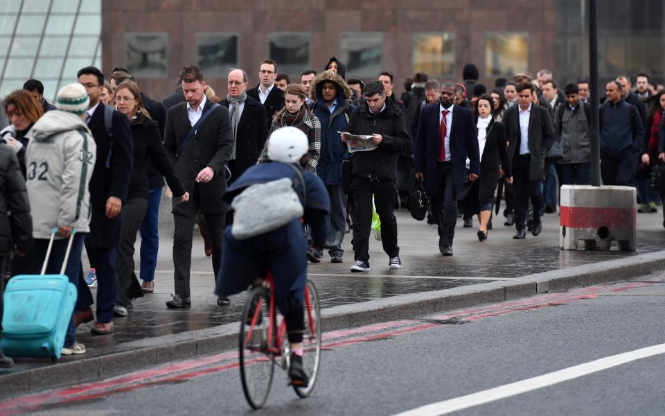 Only four per cent of Brits cycle to work - Credit: AFP