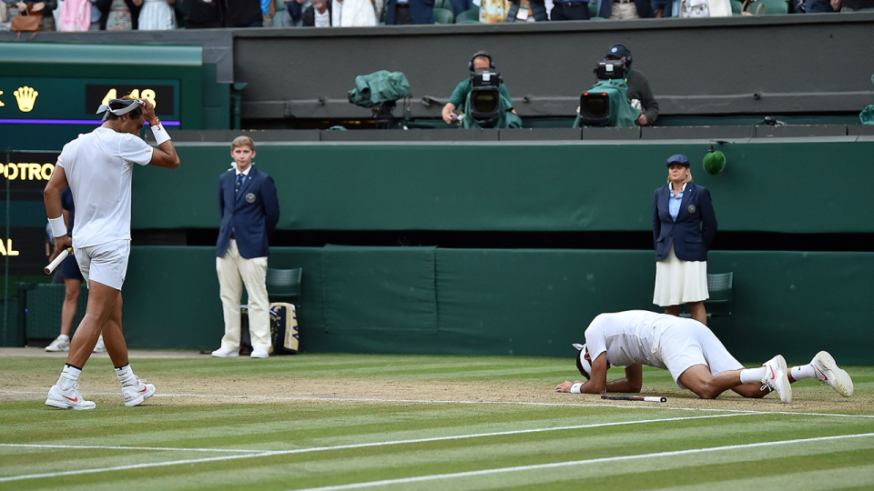 Juan Martin Del Potro slumped to the grass at Wimbledon following his defeat to Rafa. Pic: Getty