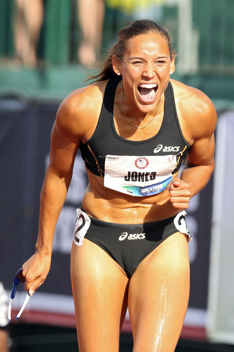 EUGENE, OR - JUNE 23: Lolo Jones reacts after qualifying for 2012 Olympics after coming in third in the women's 100 meter hurdles final during Day Two of the 2012 U.S. Olympic Track & Field Team Trials at Hayward Field on June 23, 2012 in Eugene, Oregon. (Photo by Christian Petersen/Getty Images)