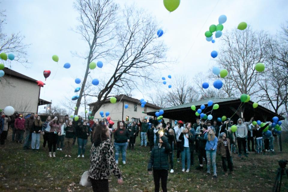 Friends, family, and classmates of 16-year-old Haylen Tabor release balloons in his memory at Mary Burnham Park in Lancaster. Tabor, a Lancaster High School student, was shot and killed during an armed robbery Tuesday, Jan. 26, 2021.