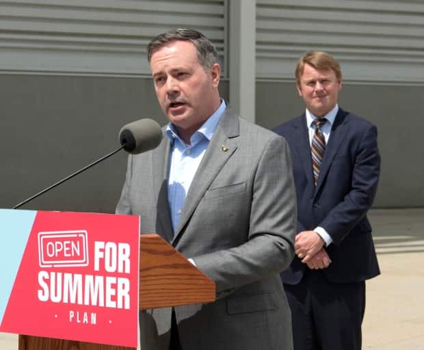 Alberta Premier Jason Kenney and Minister of Health Tyler Shandro at a press conference at the Edmonton Expo Centre on Monday, June 14, 2021.  (Chris Schwarz/Government of Alberta - image credit)