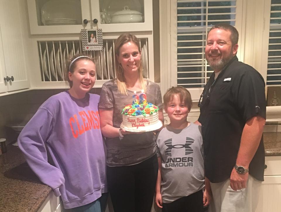 The O'Connor family celebrating with a birthday cake for mom Elizabeth O'Connor.