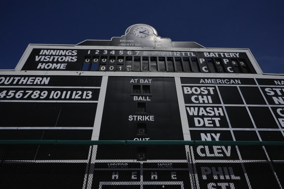 A manual scoreboard is seen at Rickwood Field, Monday, June 10, 2024, in Birmingham, Ala. Rickwood Field, known as one of the oldest professional ballpark in the United States and former home of the Birmingham Black Barons of the Negro Leagues, will be the site of a special regular season game between the St. Louis Cardinals and San Francisco Giants on June 20, 2024. (AP Photo/Brynn Anderson)
