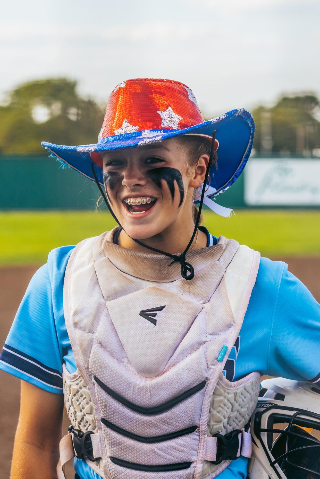 Bartlesville High's Parker Fielder smiles after a successful inning during Tuesday's game against Jenks.