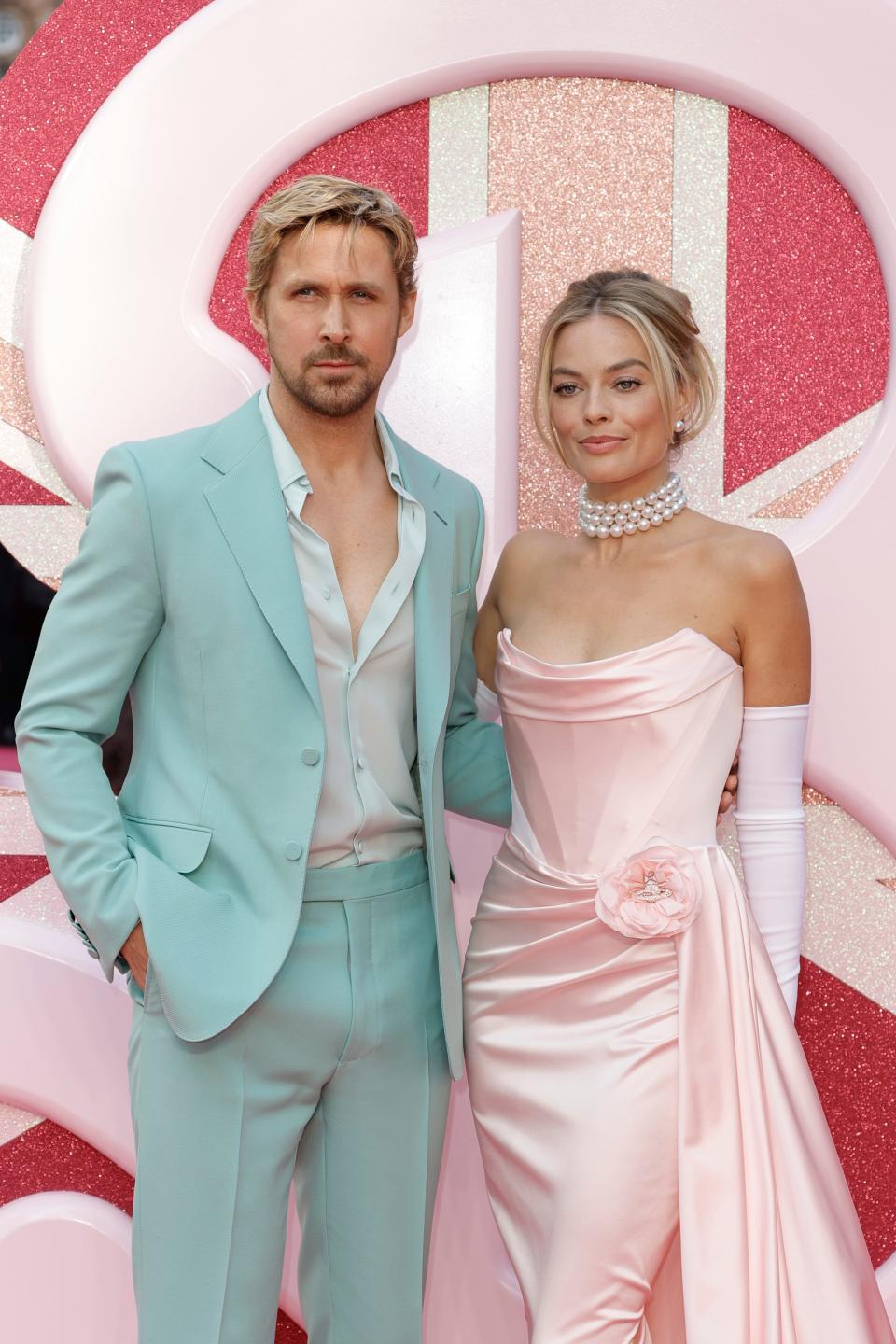Gosling, left, posed alongside his "Barbie" co-star Robbie at the film's London premiere.