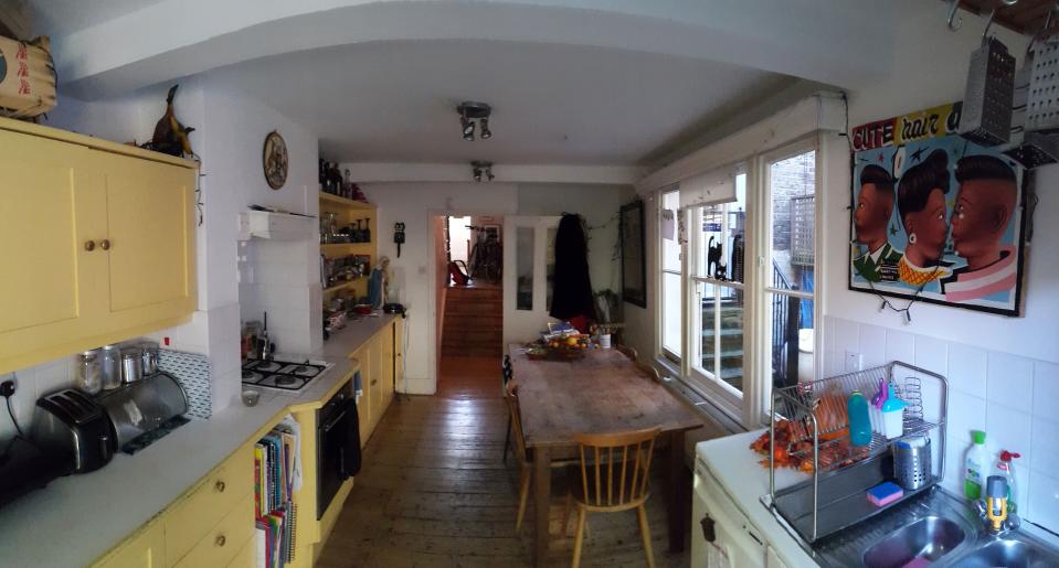 The kitchen before lacked light and space.