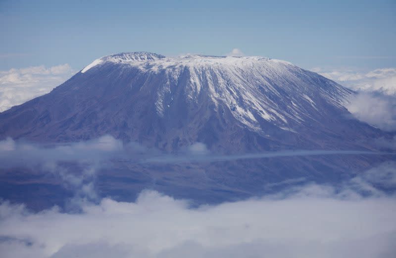 FILE PHOTO: A fresh dusting of snow sits atop mount Kilimanjaro in Tanzania