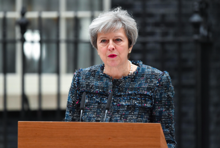 Theresa May was quick to congratulate the new French president (Rex)