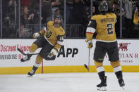 Vegas Golden Knights defenseman Noah Hanifin (15) celebrates after scoring against the Dallas Stars during the third period in Game 6 of an NHL hockey Stanley Cup first-round playoff series Friday, May 3, 2024, in Las Vegas. (AP Photo/John Locher)