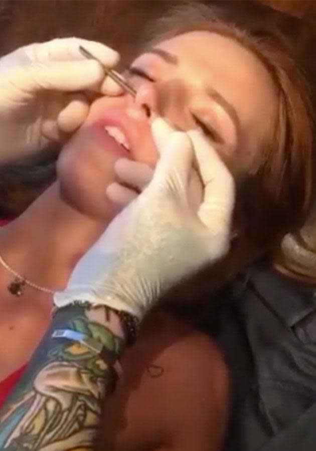 Watch The Cringe Worthy Moment Bella Thorne Gets A Septum Piercing