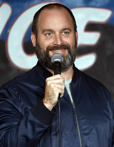 <p>Michael S. Schwartz/Getty</p> Tom Segura performs during his appearance at The Ice House Comedy Club on February 3, 2018 in Pasadena, California.