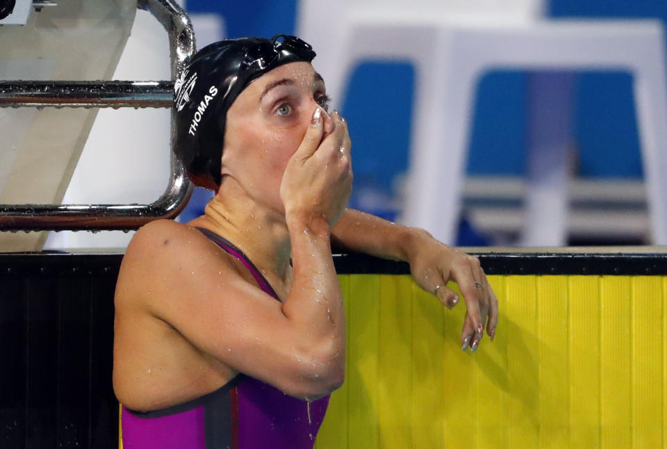 Thomas reacts to her first place result in the Commonwealth Games final (Picture: Reuters)