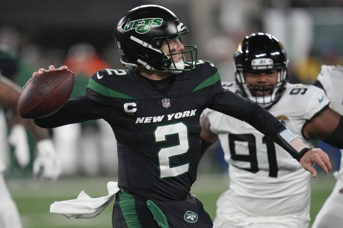 New York Jets quarterback Zach Wilson (2) passes against the Jacksonville Jaguars during the first quarter of an NFL football game, Thursday, Dec. 22, 2022, in East Rutherford, N.J. (AP Photo/Seth Wenig)