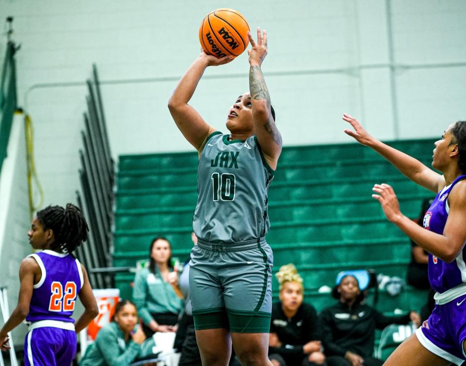 Edyn Battle of Jacksonville University goes up for two of her 28 points in an 87-70 victory over Edward Waters.