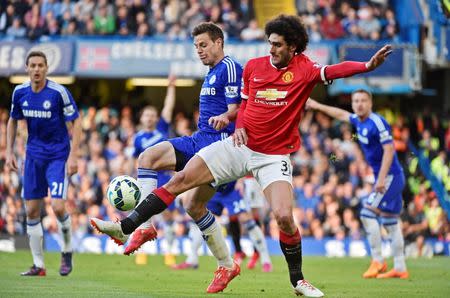Football - Chelsea v Manchester United - Barclays Premier League - Stamford Bridge - 18/4/15 Manchester United's Marouane Fellaini in action with Chelsea's Cesar Azpilicueta Reuters / Toby Melville Livepic